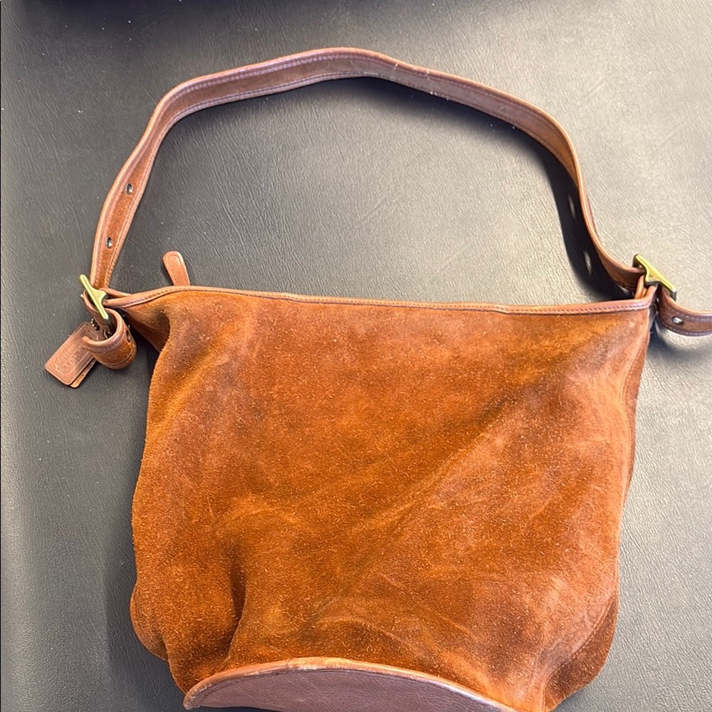 Authentic Coach Rusty Brown Suede bag is gorgeous. Good condition.